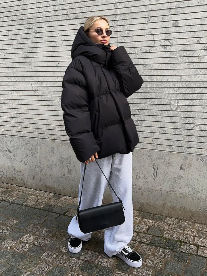Piumino donna oversize con zip frontale